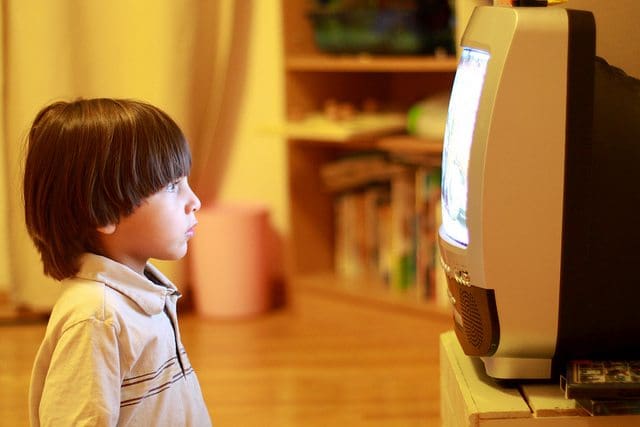 kid watching TV